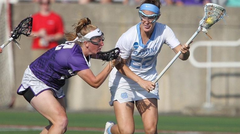 James Madison's Rebecca Tooker defends North Carolina's Maggie Bill during...