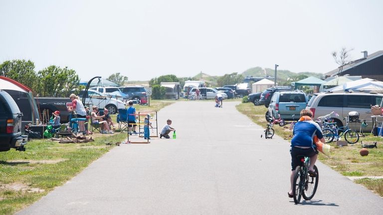 Children play along the campground road at Hither Hills Beach...