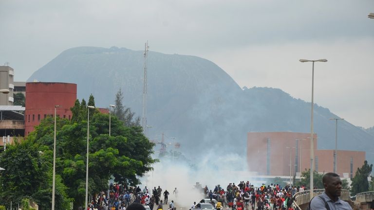 Police fired tear gas during a protest in Abuja, Nigeria,...