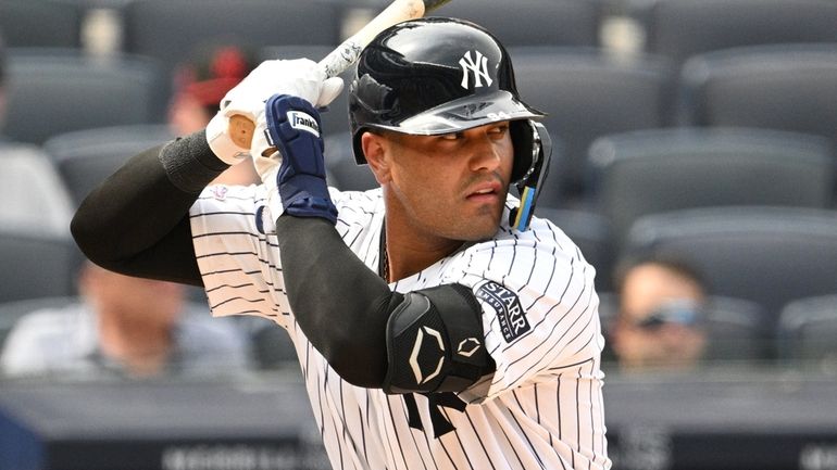 Yankees catcher Carlos Narvaez looks for his pitch against the...