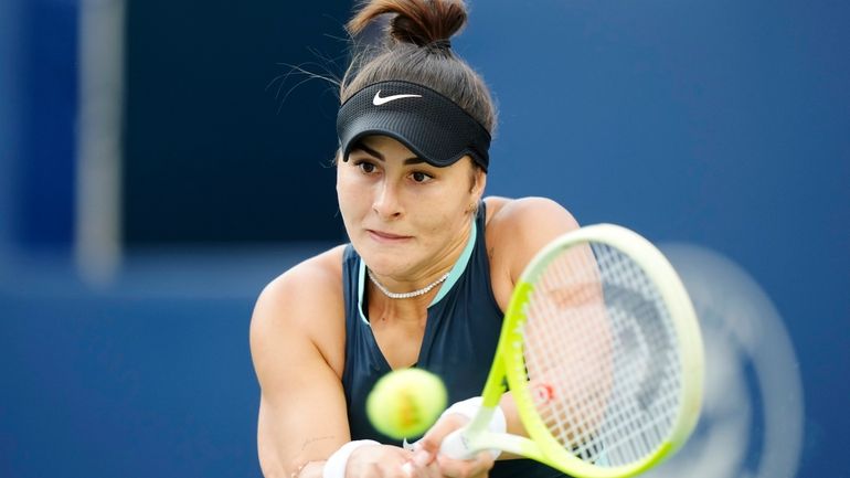 Bianca Andreescu of Canada celebrates a point against Lesia Tsurenko...