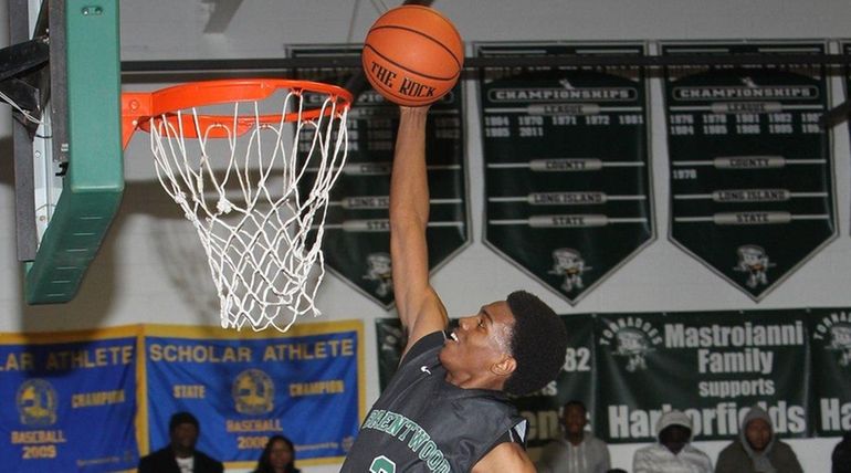 Brentwood's Ramel Allen (2) goes to the net in the...