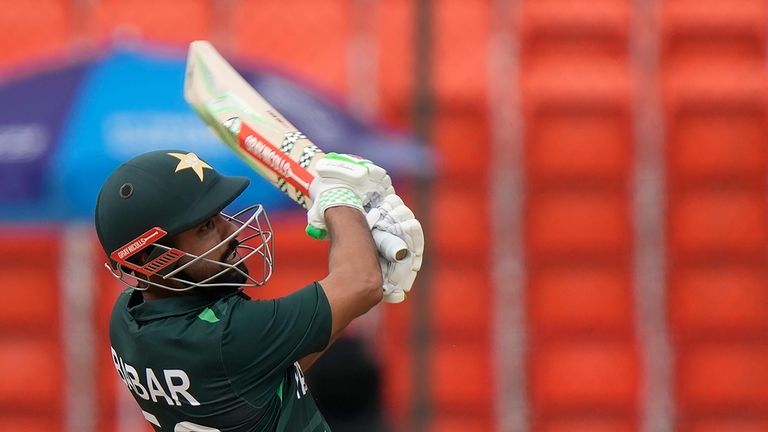 Pakistan's captain Babar Azam plays a shot during the ICC...