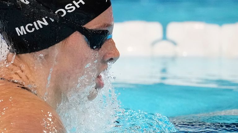 Canada' s Summer McIntosh competes in a women's 200-meter individual...