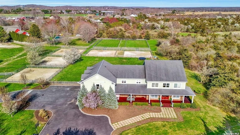 This $4.25 million Calverton home sits on 5 acres of...