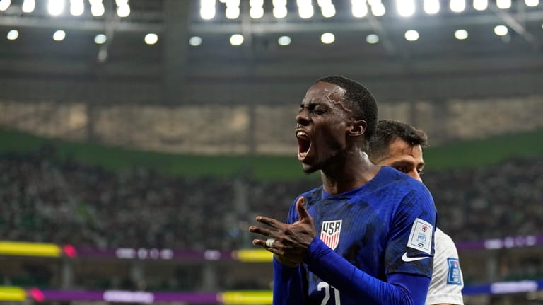 United States' Tim Weah (21) reacts after losing the ball...