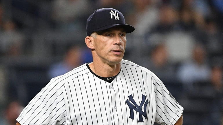 New York Yankees manager Joe Girardi looks on against the...
