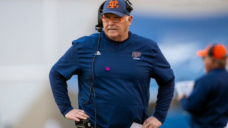 UTEP coach Dana Dimel reacts after talking to his players...