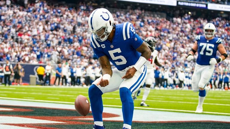 Indianapolis Colts quarterback Anthony Richardson (5) celebrates after a touchdown...