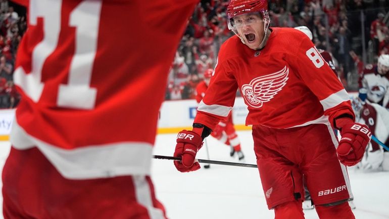 Detroit Red Wings right wing Patrick Kane (88) celebrates his...