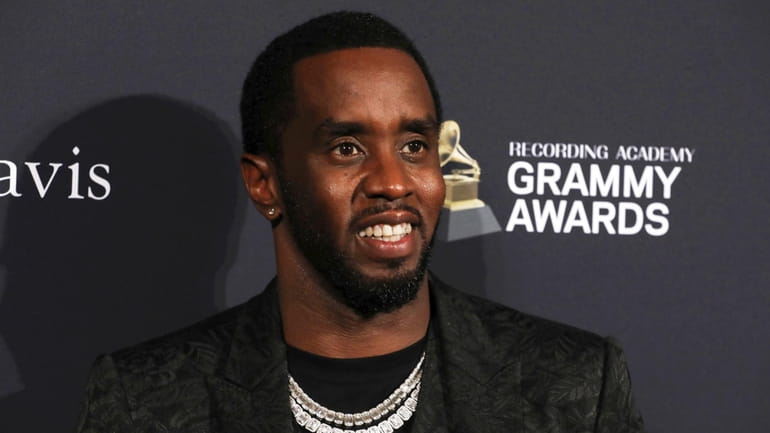 Sean Combs arrives at the Pre-Grammy Gala And Salute To...