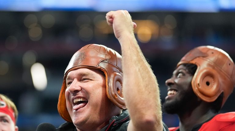 Georgia head caoch Kirby Smart wears the Old Leather helmet...