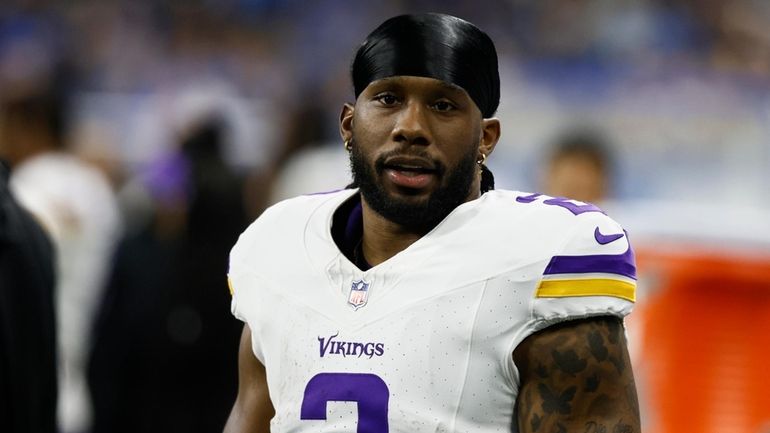 Minnesota Vikings running back Alexander Mattison (2) looks on before...