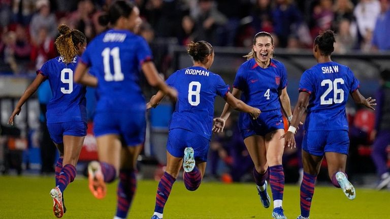 United States' Sam Coffey (4) celebrates her second half goal...