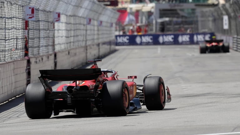 Ferrari driver Charles Leclerc of Monaco steers his car during...