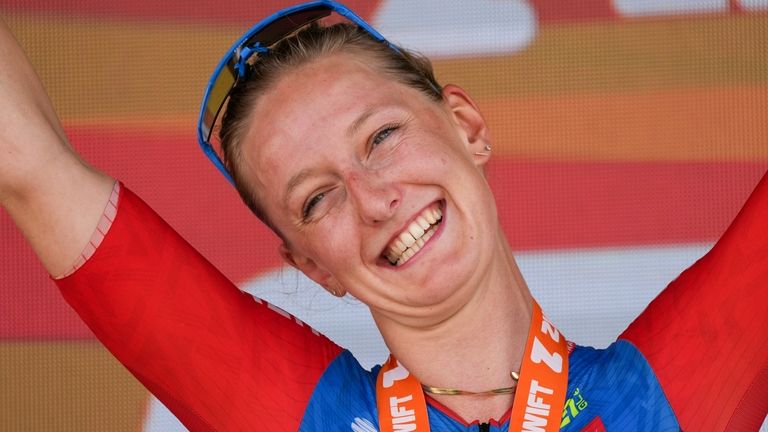 Stage winner Cedrine Kerboal of France celebrates on the podium...