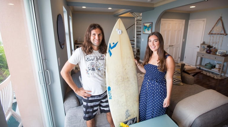 Surfers Andrew and Jeanette Lerner at their Lido Beach condo.