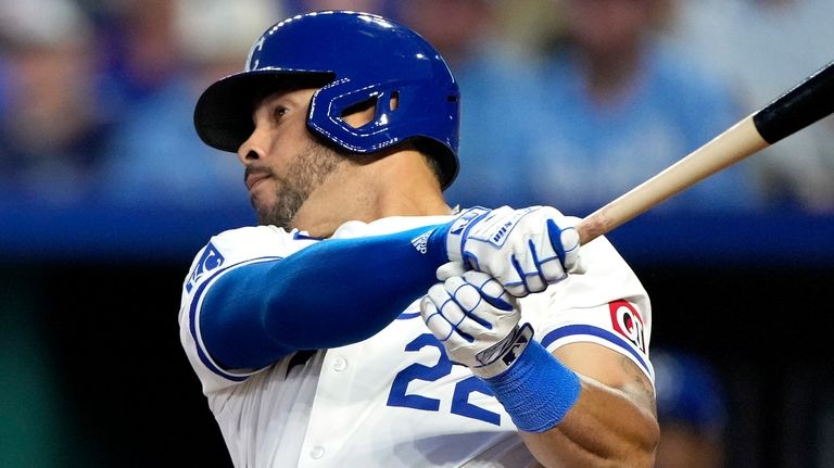 Kansas City Royals' Tommy Pham watches his three-run home run...