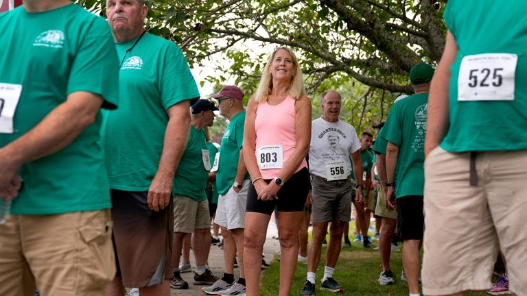 Carolyn Baker, a runner who suffered from heatstroke last year,...