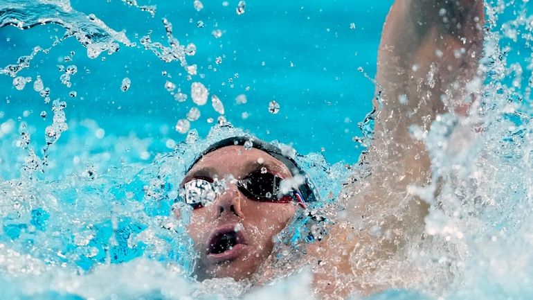 Ryan Murphy, of the United States, competes in the men's...