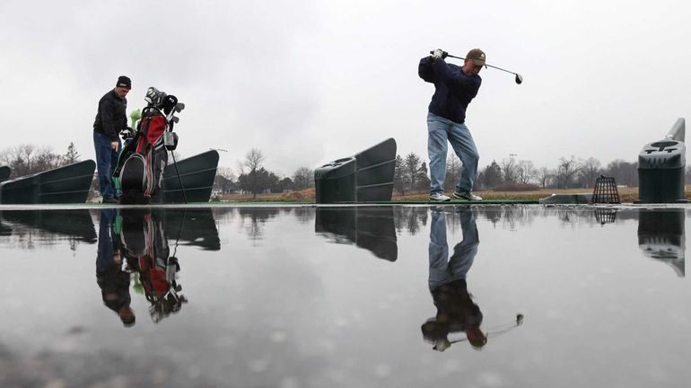 Timothy King, right, and Peter Mueller, both of Merrick, are...