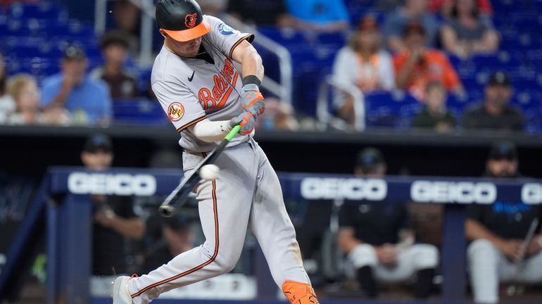 Baltimore Orioles' Ryan Mountcastle hits a single scoring Jordan Westburg...