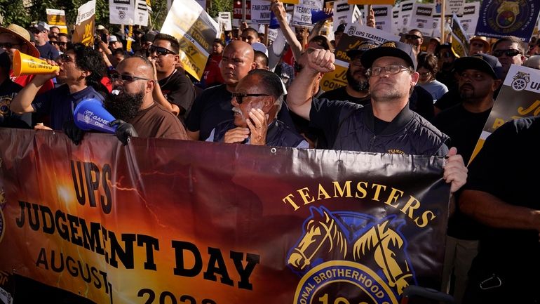 UPS teamsters and workers hold a rally in downtown Los...