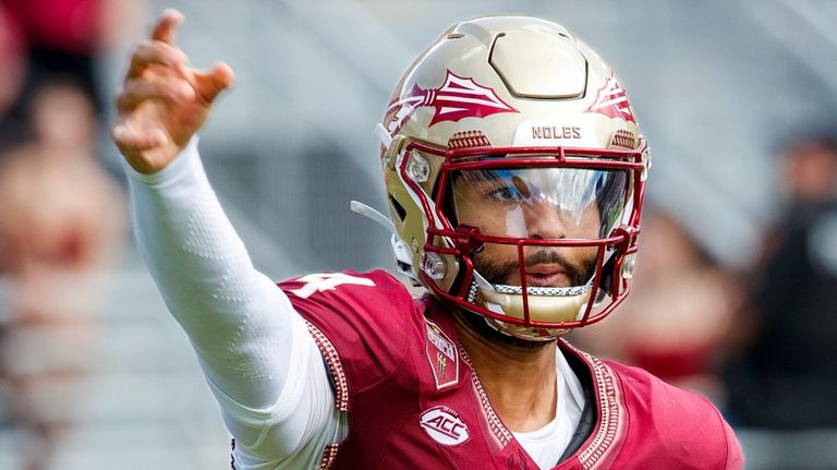 Florida State quarterback DJ Uiagalelei (4) throws a pass against...