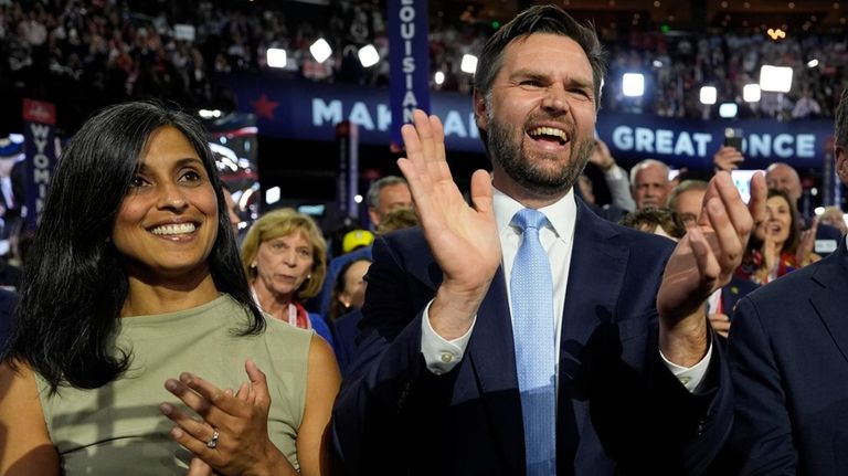 Republican vice presidential candidate Sen. JD Vance, R-Ohio, and his...