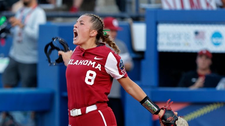 Oklahoma pitcher Alex Storako celebrates after an out against Florida...