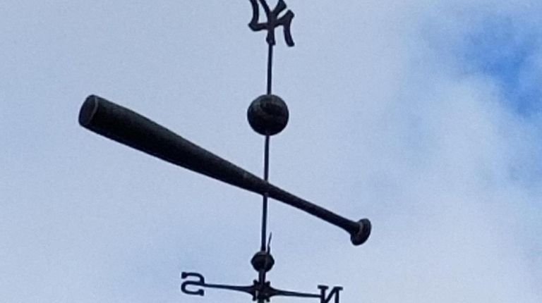 The weather vane.