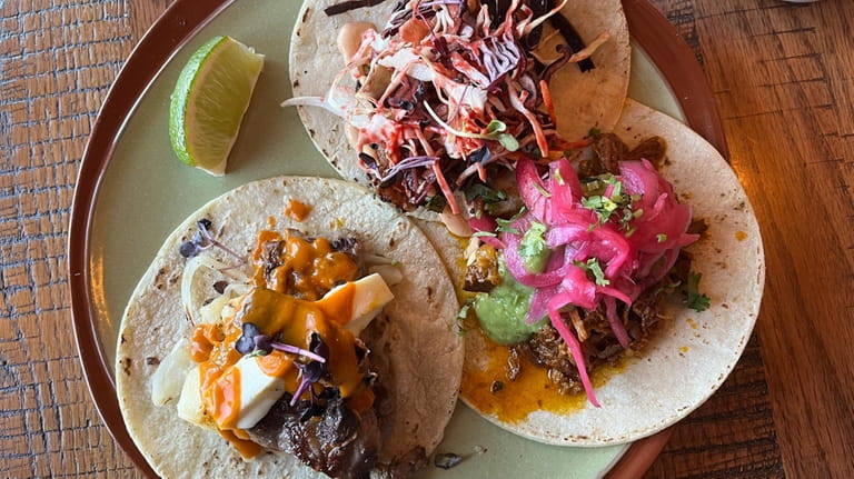 Three tacos at Ruta Oaxaca, clockwise from left: New York...
