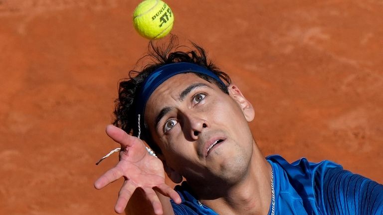 Chile's Alejandro Tabilo serves to Germany's Alexander Zverev during a...