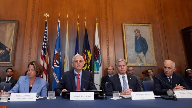 Attorney General Merrick Garland speaks before a meeting of the...