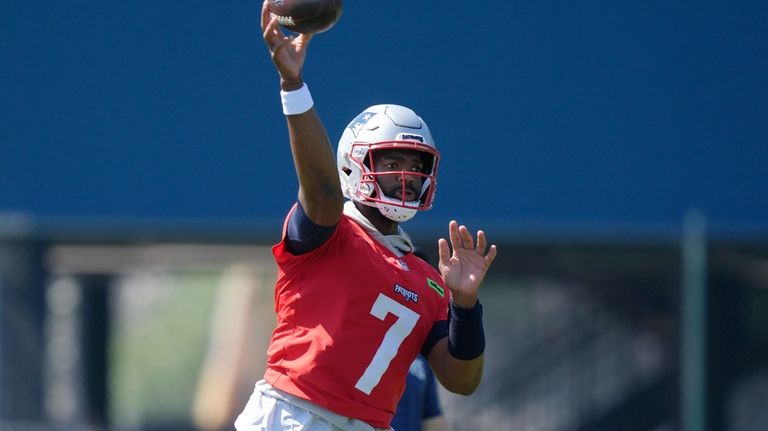 New England Patriots quarterback Jacoby Brissett passes the ball during...