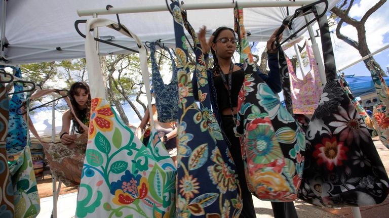 Leila Dupont sells handbags at the Arts in the Plaza...