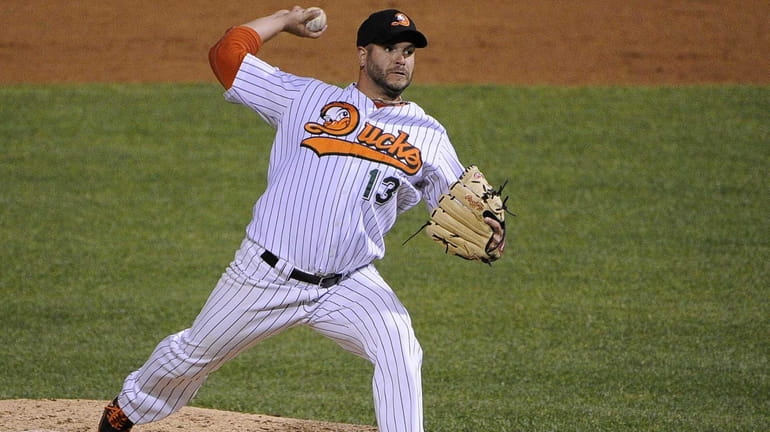 Long Island Ducks pitcher Jason Monti delivers in the fifth...