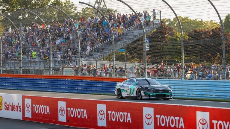 Chris Buescher nears the finish line during a NASCAR Cup...