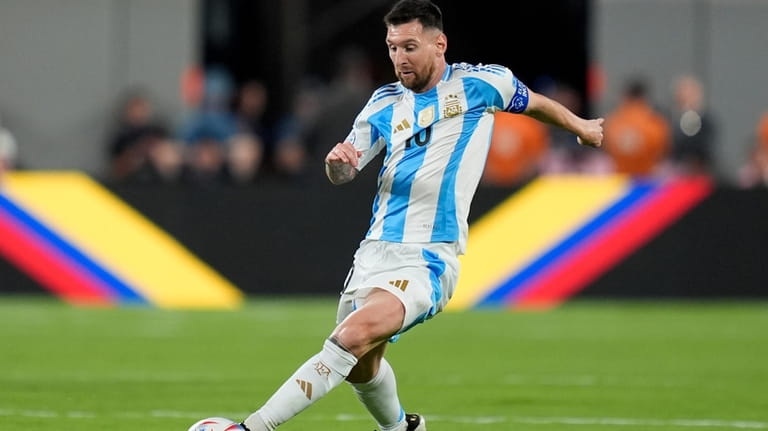 Argentina's Lionel Messi dribbles during a Copa America Group A...