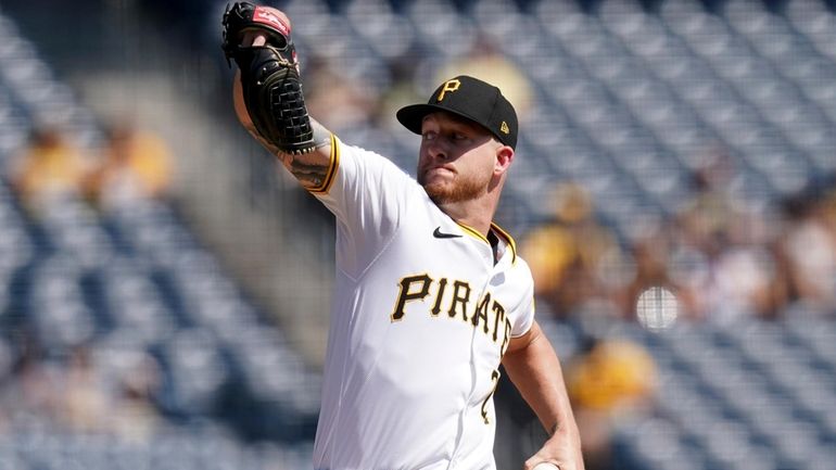 Pittsburgh Pirates starting pitcher Bailey Falter delivers during the first...