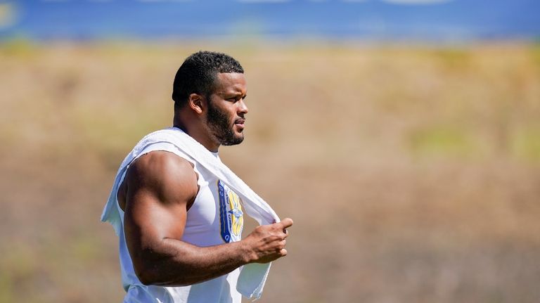 Los Angeles Rams defensive tackle Aaron Donald walks during a...