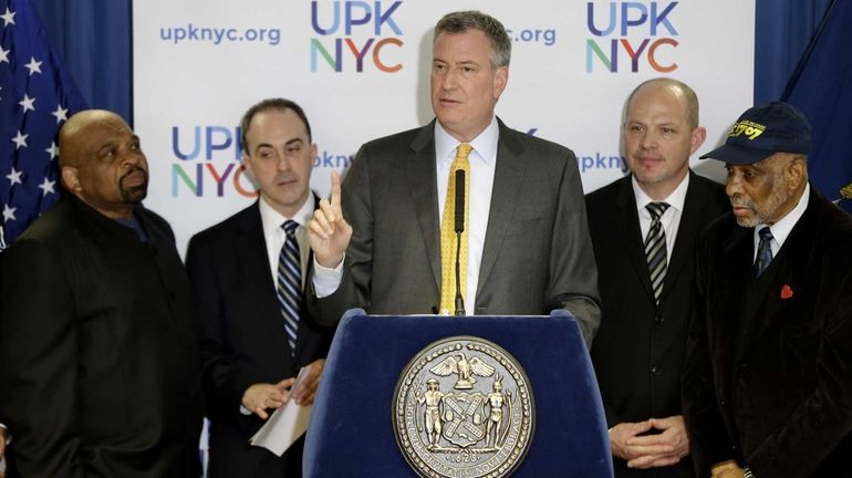 With labor leaders, New York Mayor Bill de Blasio speaks...