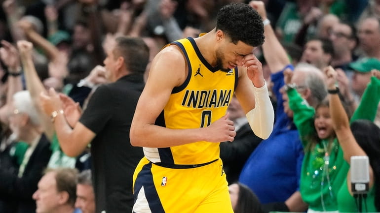 Indiana Pacers guard Tyrese Haliburton (0) reacts after missing a...