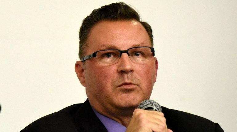 North Babylon superintendent Glen Eschbach during a school board meeting,...