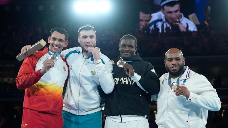 Silver medalist Spain's Ayoub Ghadfa, from left, gold medalist Uzbekistan's...