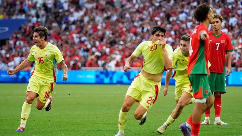 Spain's Juanlu Sanchez celebrates scoring his side's second goal during...