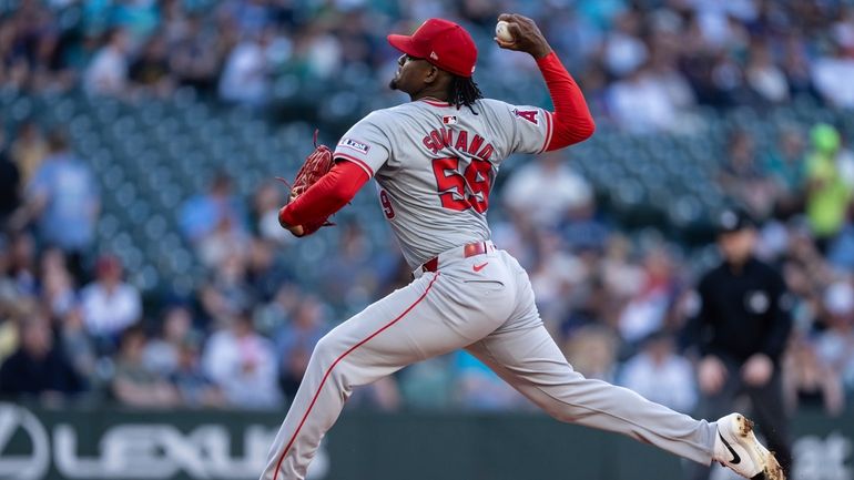 Los Angeles Angels starter Jose Soriano delivers a pitch during...