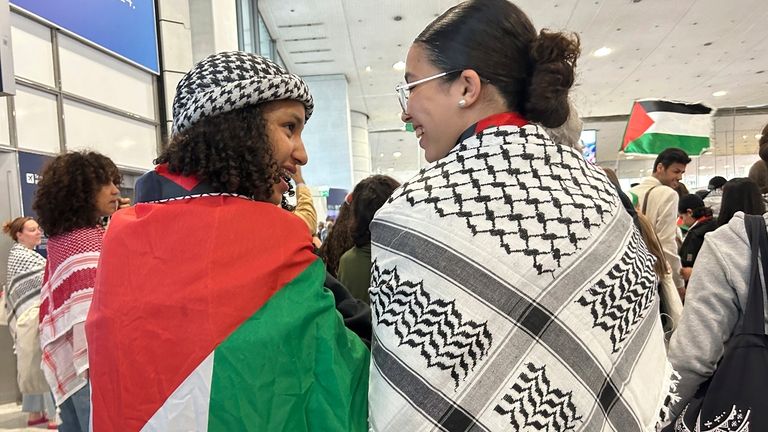 Supporters wait for Palestinian athletes at the Paris Charles de...