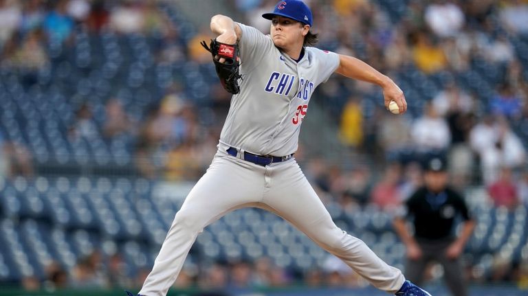 Ian Happ gets 3 hits as Cubs beat Brewers 5-4 on opening day