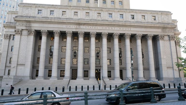 The Thurgood Marshall United States Courthouse, center, is located at...